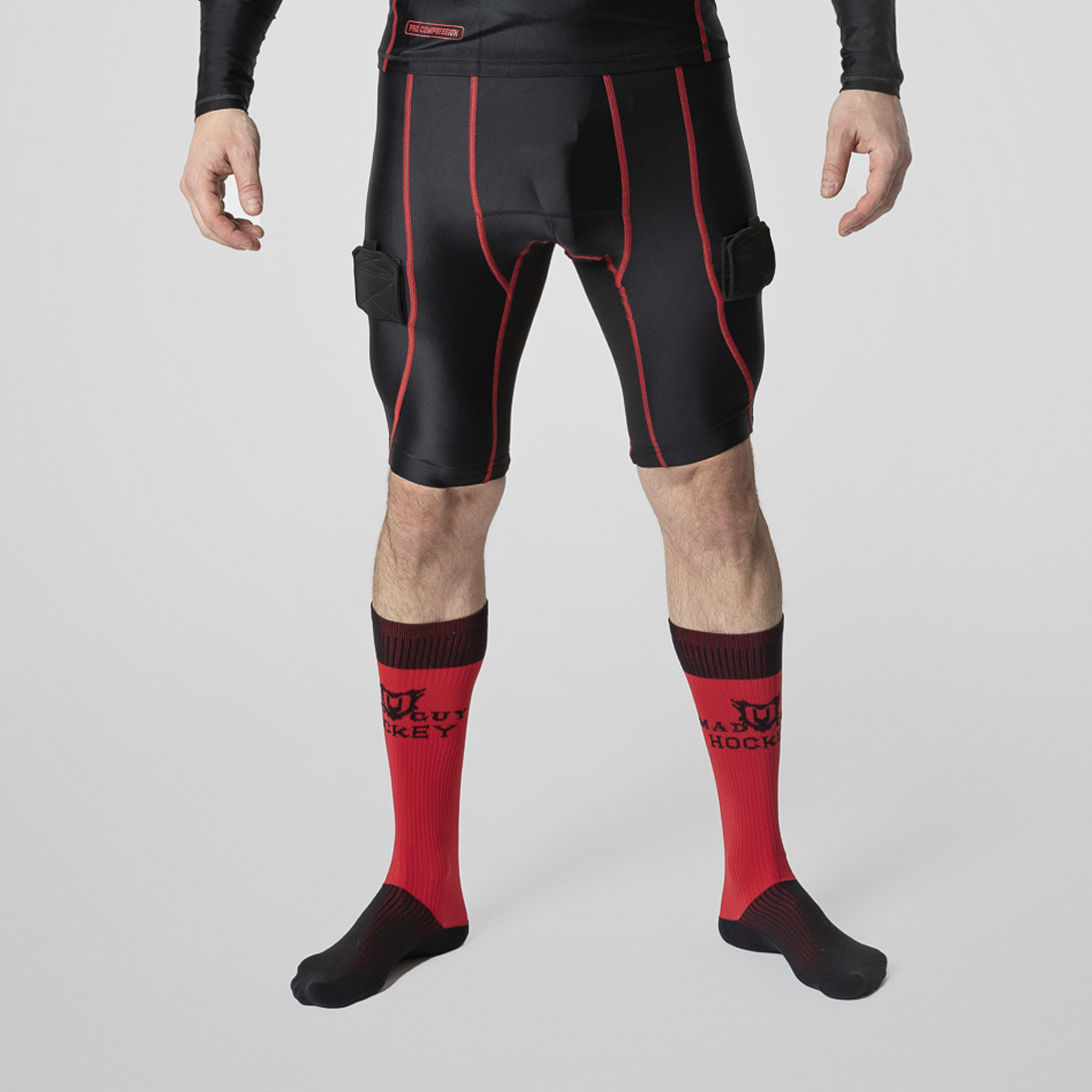 Шорты с защитной пластиковой раковиной Mad Guy Pro Compression JR