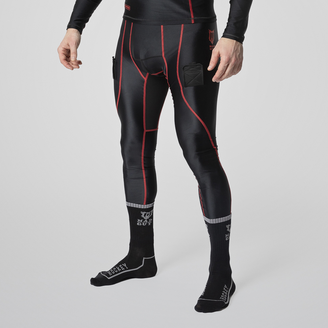 Брюки с защитной пластиковой раковиной Mad Guy Pro Compression JR черный\черный