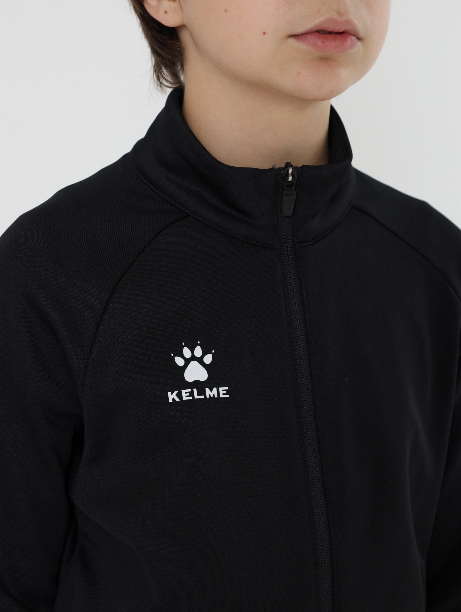 Детская олимпийка Kelme Children's Knitted Jacket (fleece) 7461WT3143-000 Black