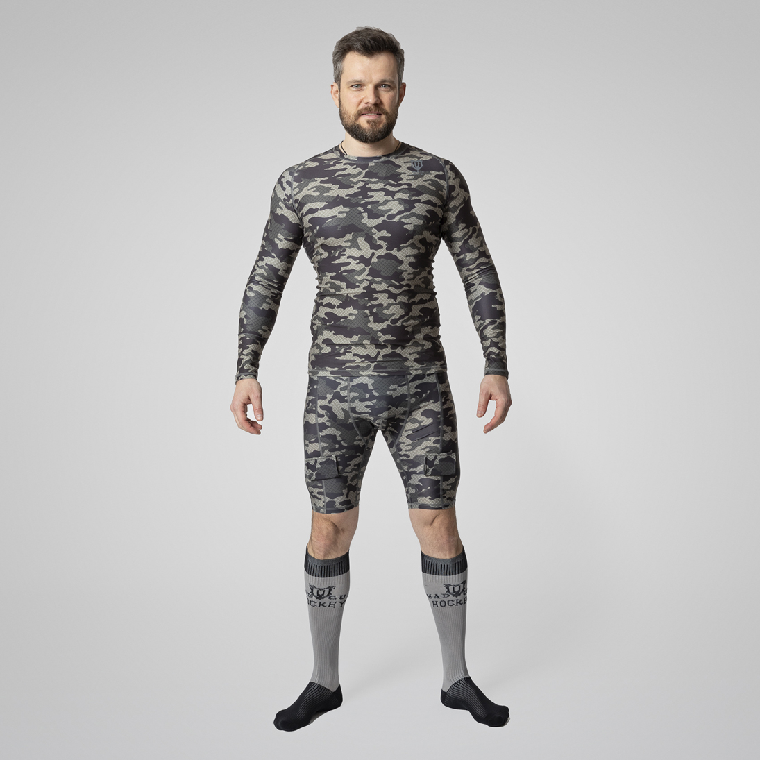Шорты с защитной пластиковой раковиной Mad Guy Camo-Line JR net\коричневый