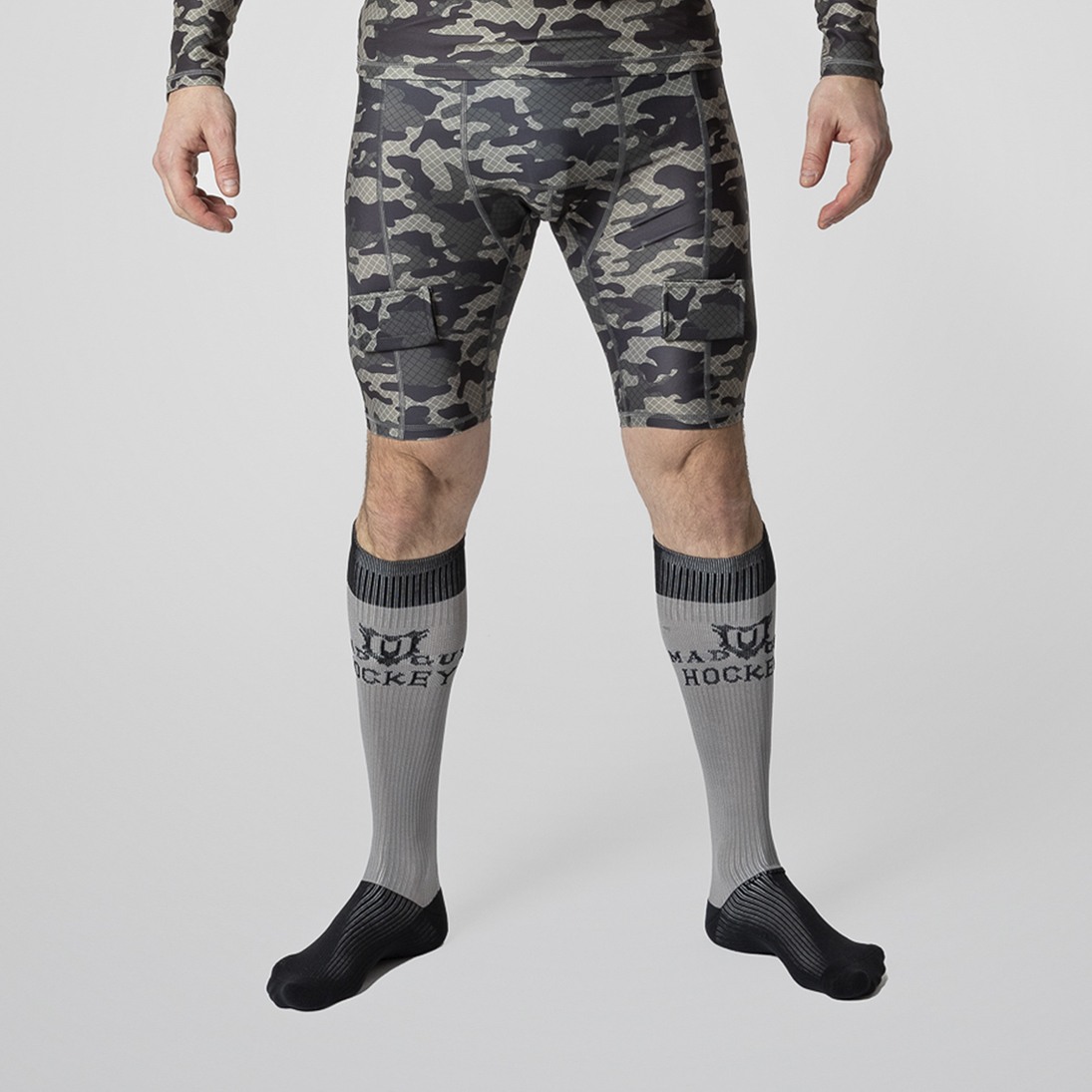 Шорты с защитной пластиковой раковиной Mad Guy Camo-Line JR net\коричневый