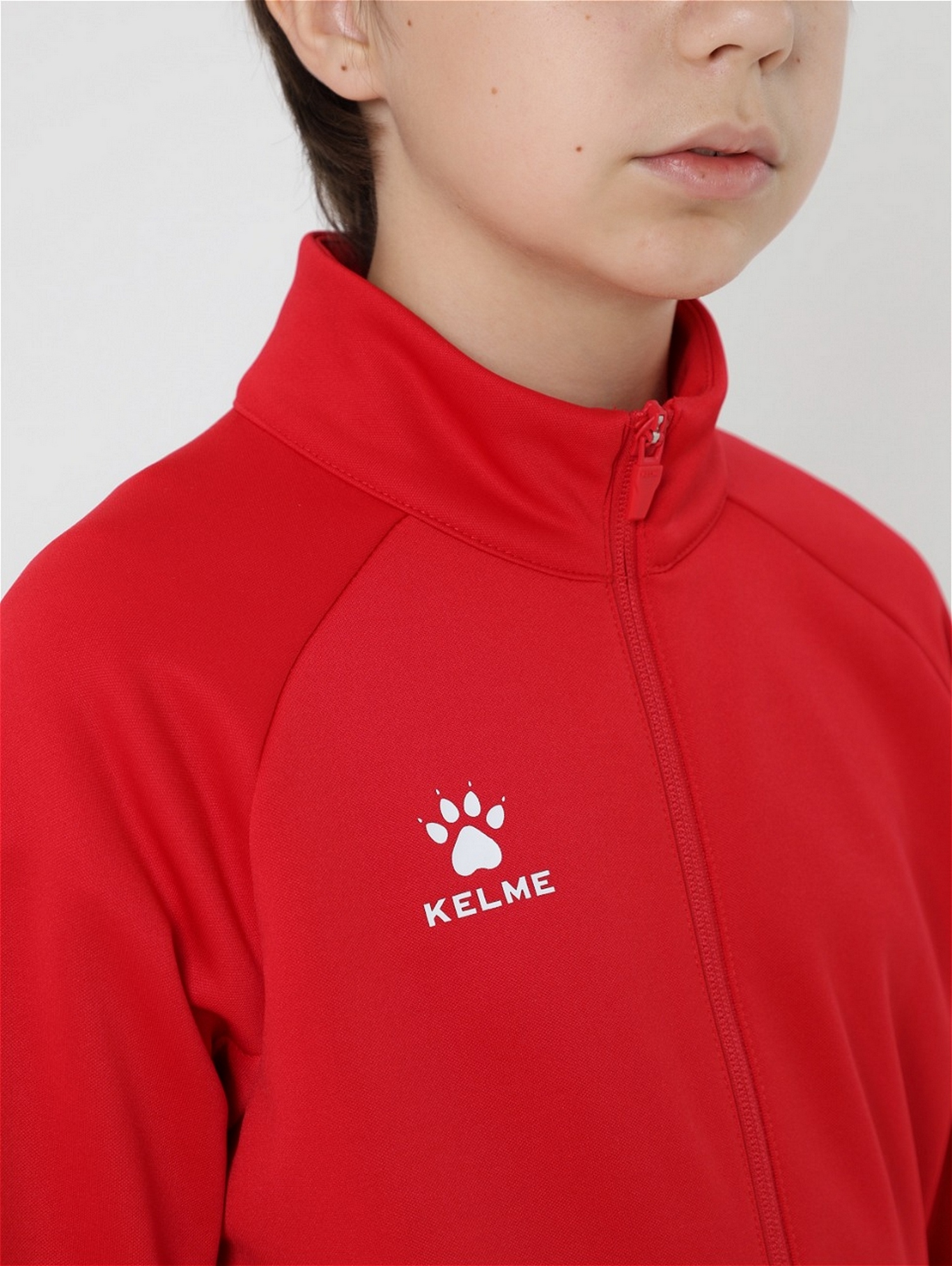 Детская олимпийка Kelme Children's Knitted Jacket (fleece) 7461WT3143-600 Red