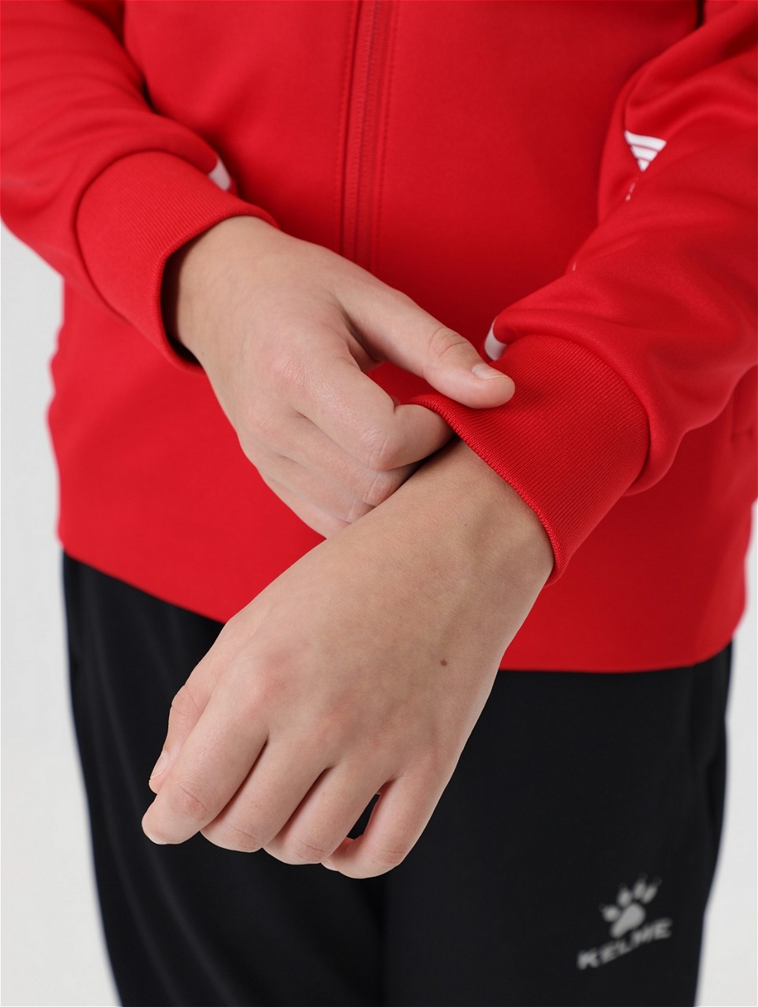Детская олимпийка Kelme Children's Knitted Jacket (fleece) 7461WT3143-600 Red