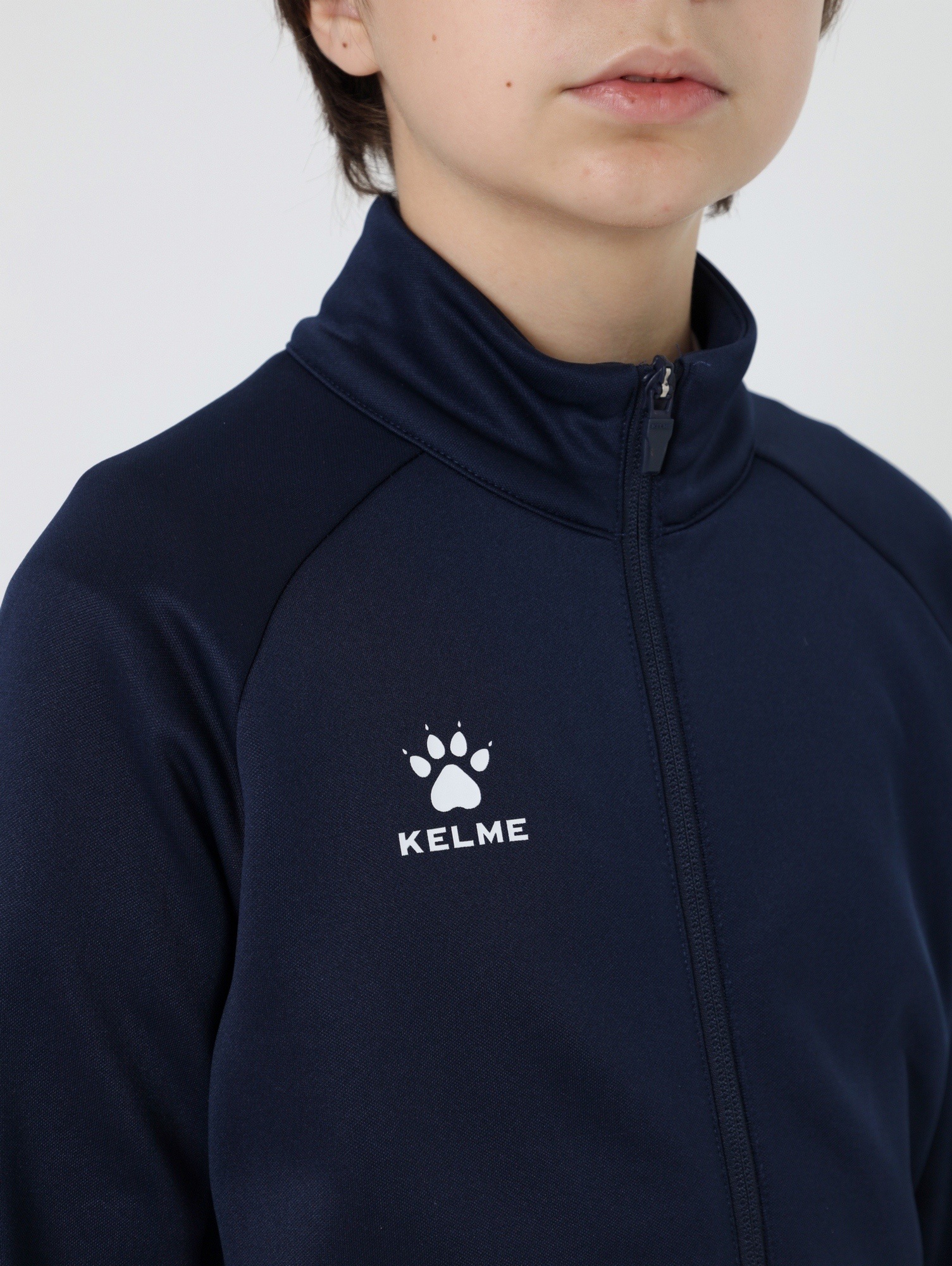 Детская олимпийка Kelme Children's Knitted Jacket (fleece) 7461WT3143-416 Dark Blue